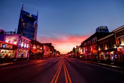 Nashville's broadway entertainment district for country music at dusk