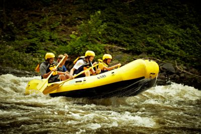 People white water rafting in Smoky Mountains
