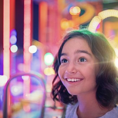 Girl close-up in an arcade 
