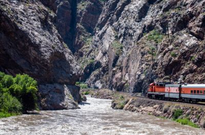 colorado rockies train ride mountains flowing river