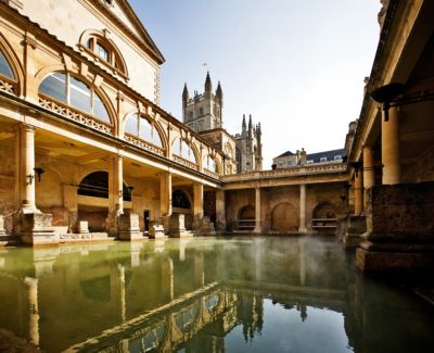 england bath roman baths with bath abbey reflection