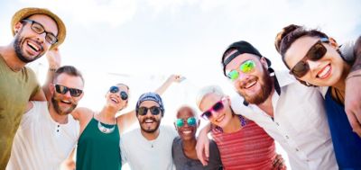 group of friends hugging taking photo