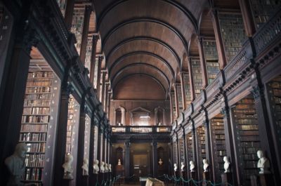 
ireland trinity college library old shelves books