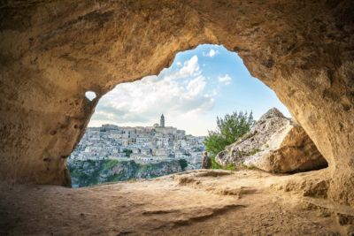 italy basilicata matera woman walking in cave