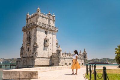 portugal lisbon woman in front of tower of delem