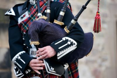 scotland close up mid section man playing bagpipes
