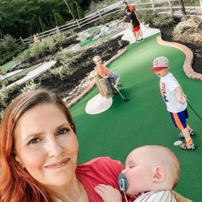 social ugc hillary ginn mother with boys mini golf