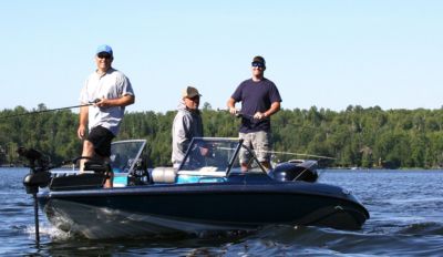three men fishing on boat freshwater